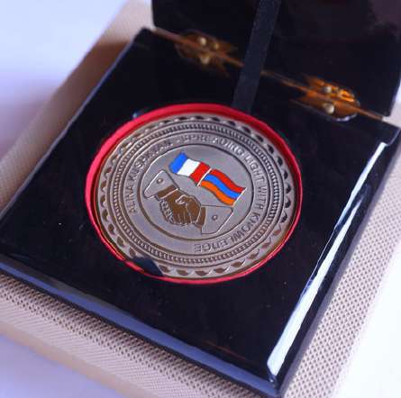 Spreading Light with Knowledge medal